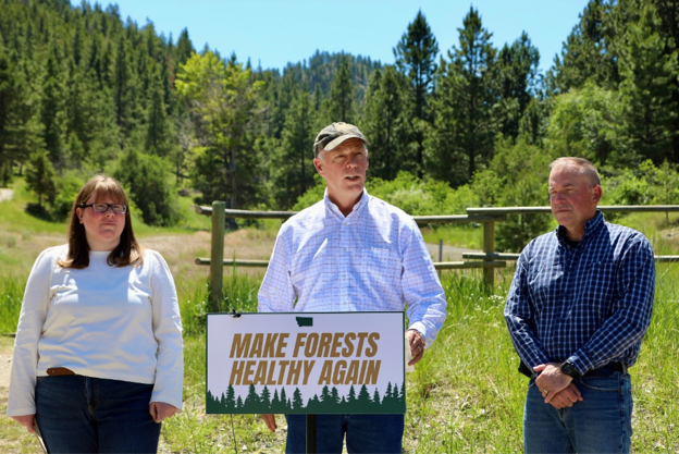 Gov. Gianforte speaking alongside DNRC Director Amanda Kaster (left) and Forest Service Chief Schultz (right) before signing a historic Shared Stewardship Agreement in Helena in June 2025 
