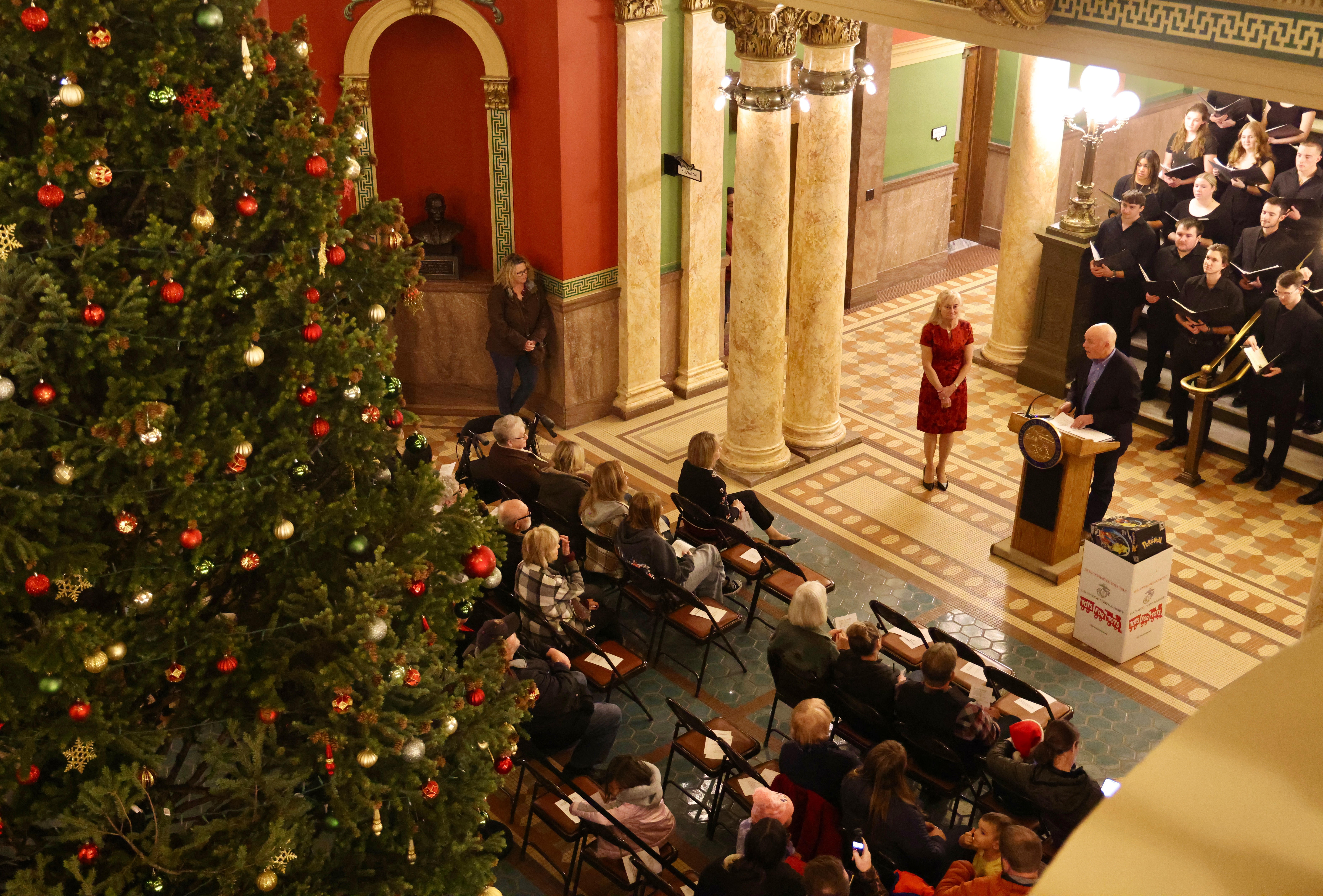 Gov. and First Lady Gianforte speaking during the Christmas tree lighting ceremony in the State Capitol