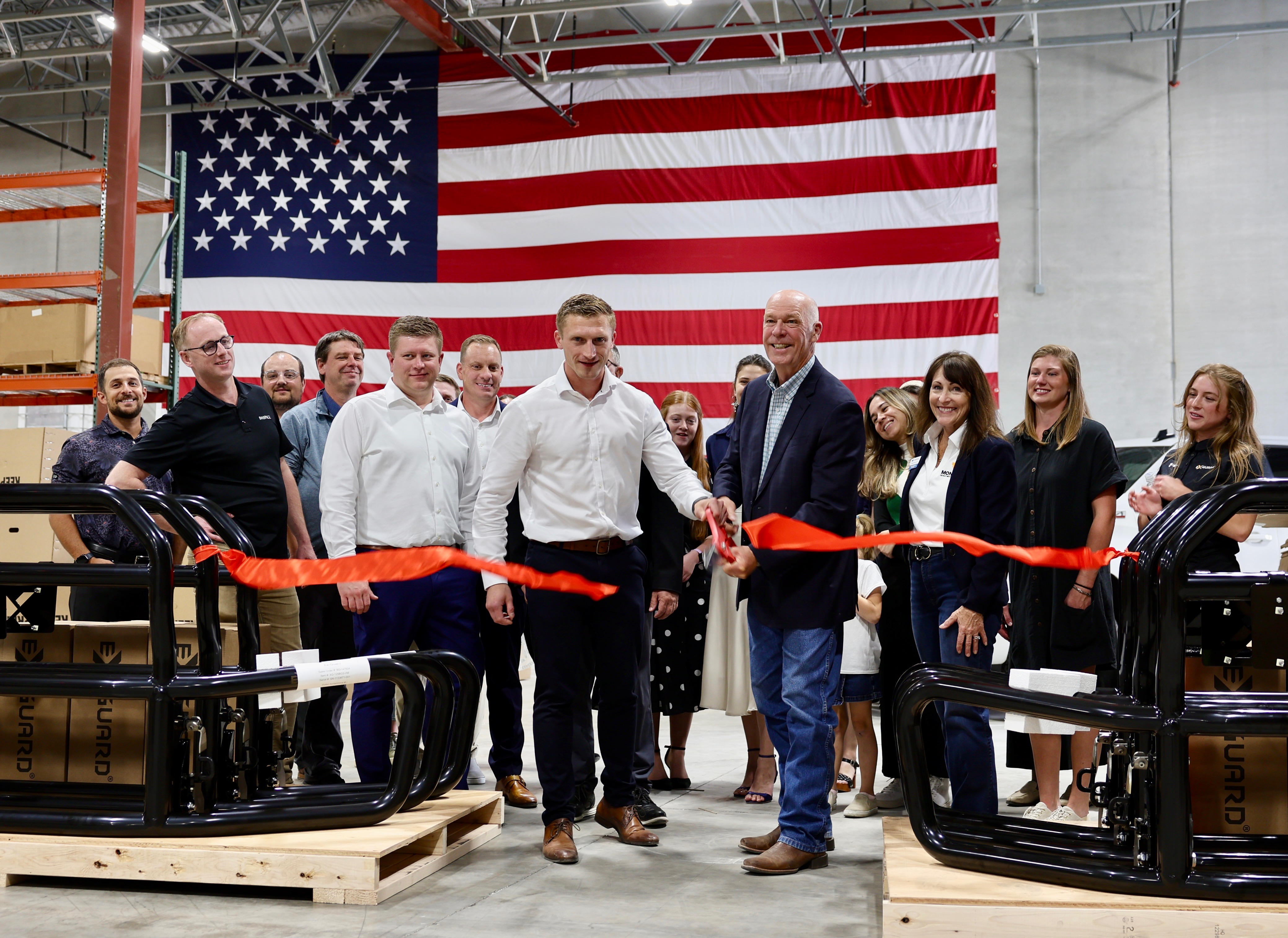 Gov. Gianforte cutting the ribbon for the Ex-Guard manufacturing facility in Kalispell