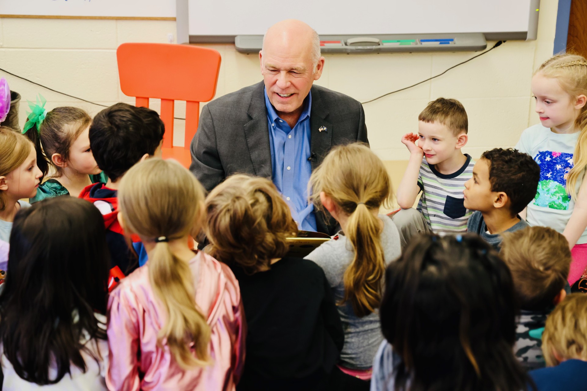 Gov. Gianforte reading to elementary students at a Helena public school in February 2023