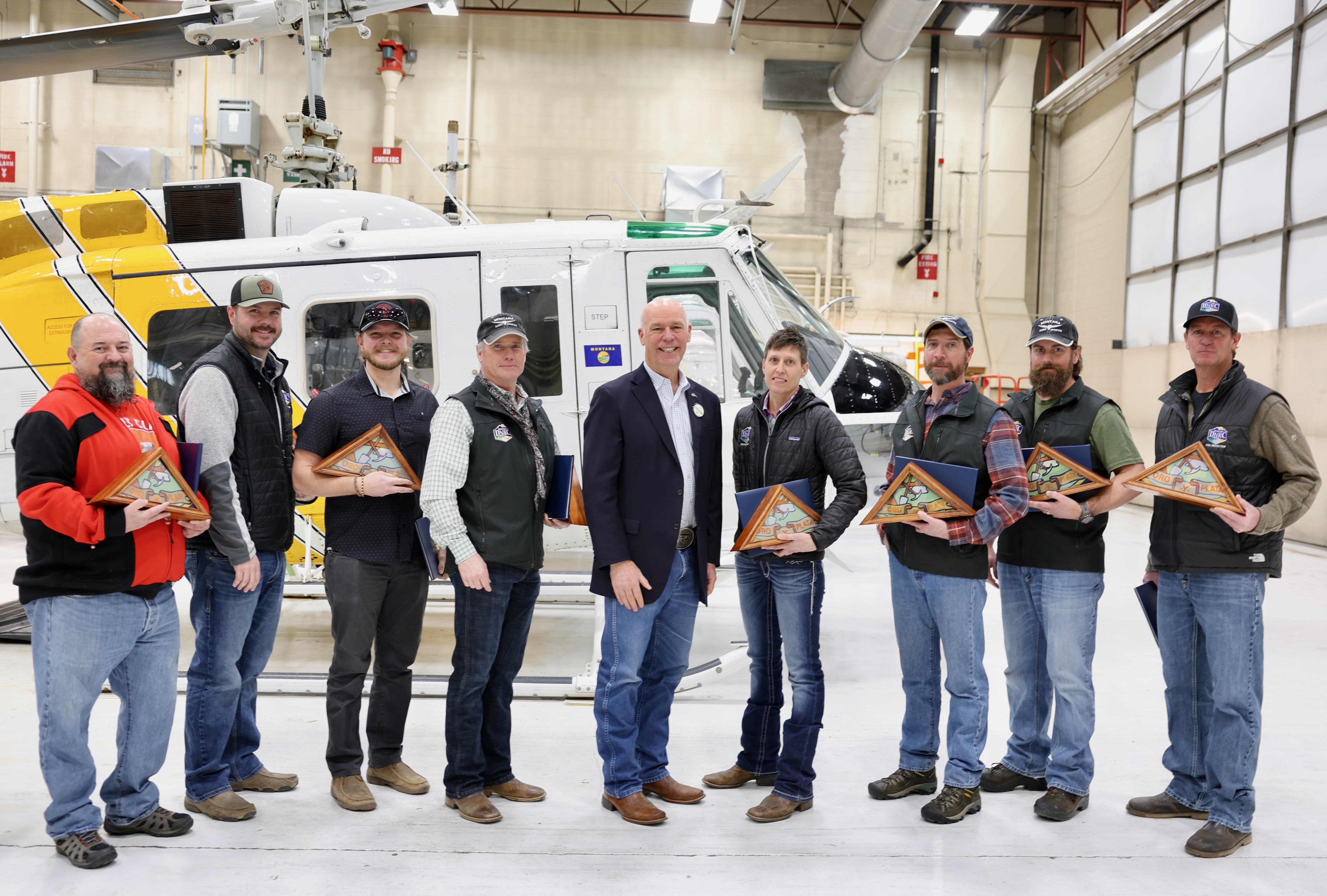 Gov. Gianforte recognizing DNRC employees with his Outstanding Service Award during a ceremony held in Helena