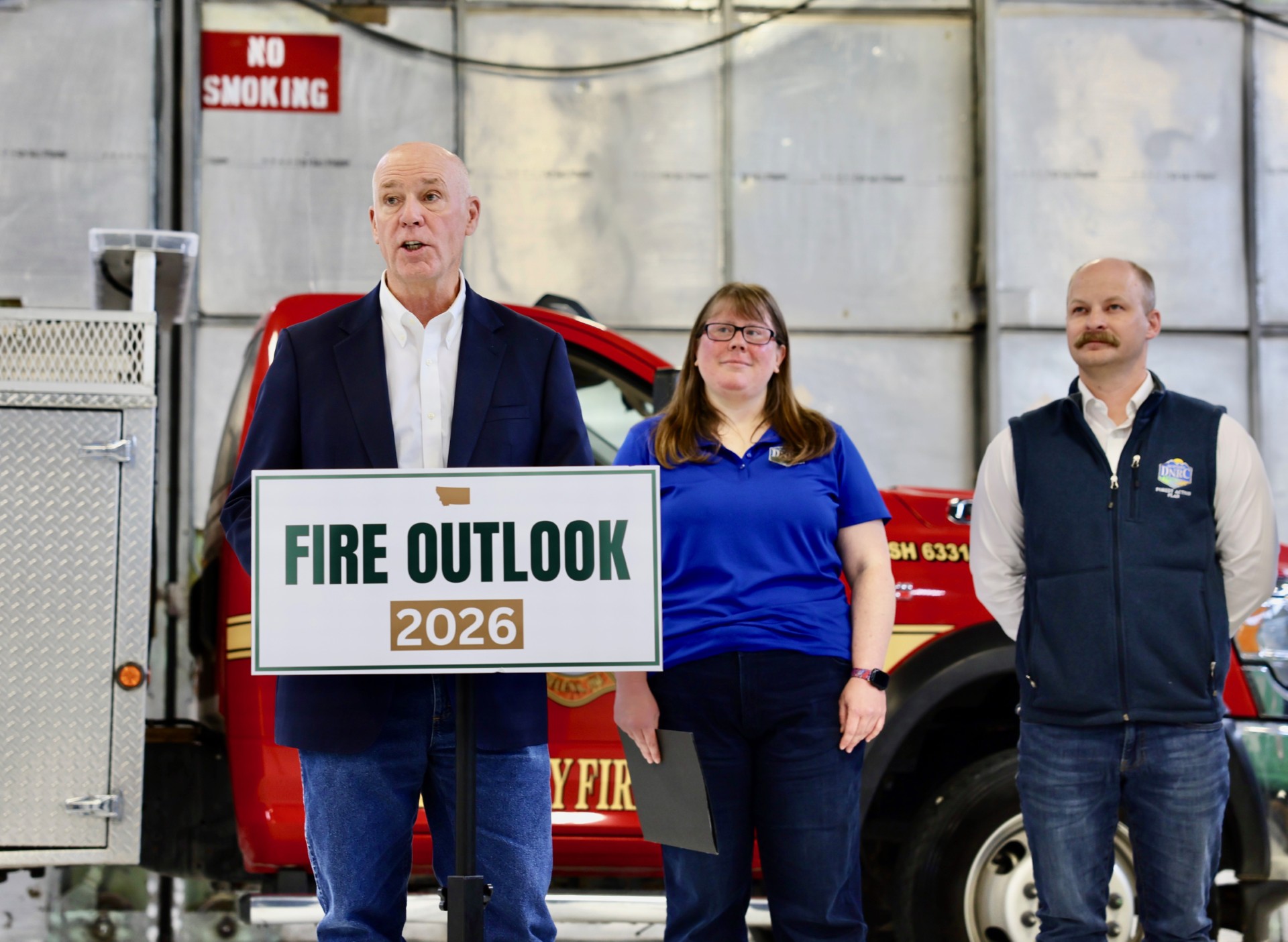 Gov. Gianforte, DNRC Director Kaster, and DNRC Acting State Forester Wyatt Frampton, from left to right, speaking during the 2026 Fire Briefing and Outlook 