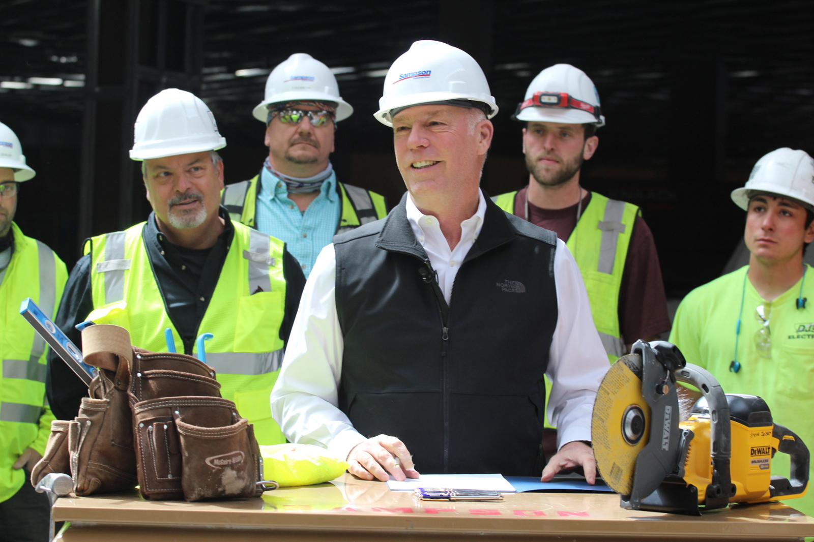 Governor Gianforte signs M-TEC into law among apprentice electricians at D.J.'s Electric.