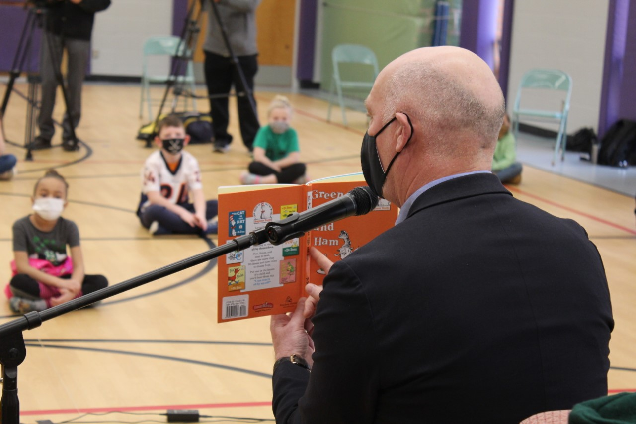 Governor Gianforte reads Dr. Seuss' Green Eggs and Ham ;to a classroom of first-grade students