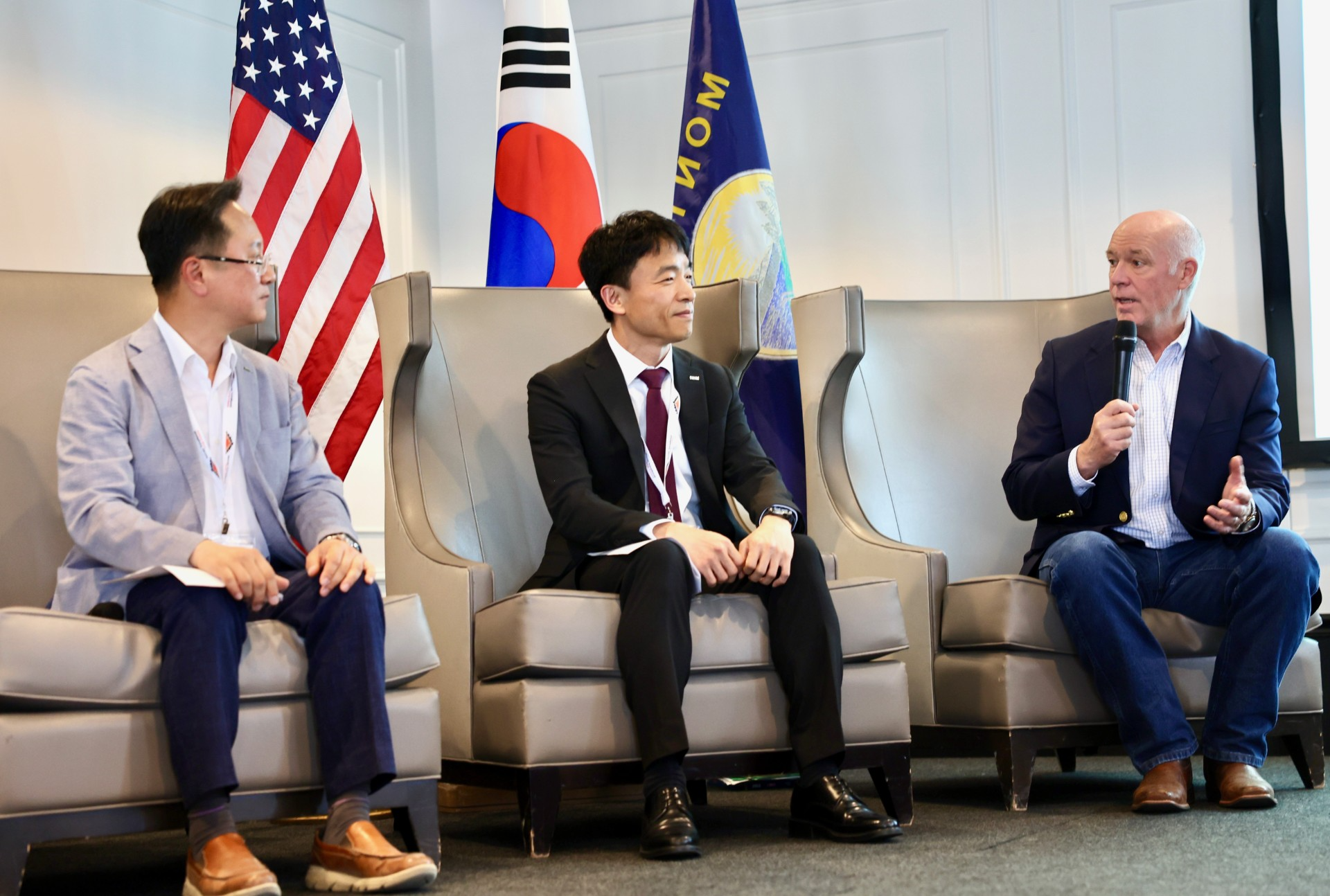 Gov. Gianforte talking with representatives of Korea’s major energy companies during a meeting in Billings