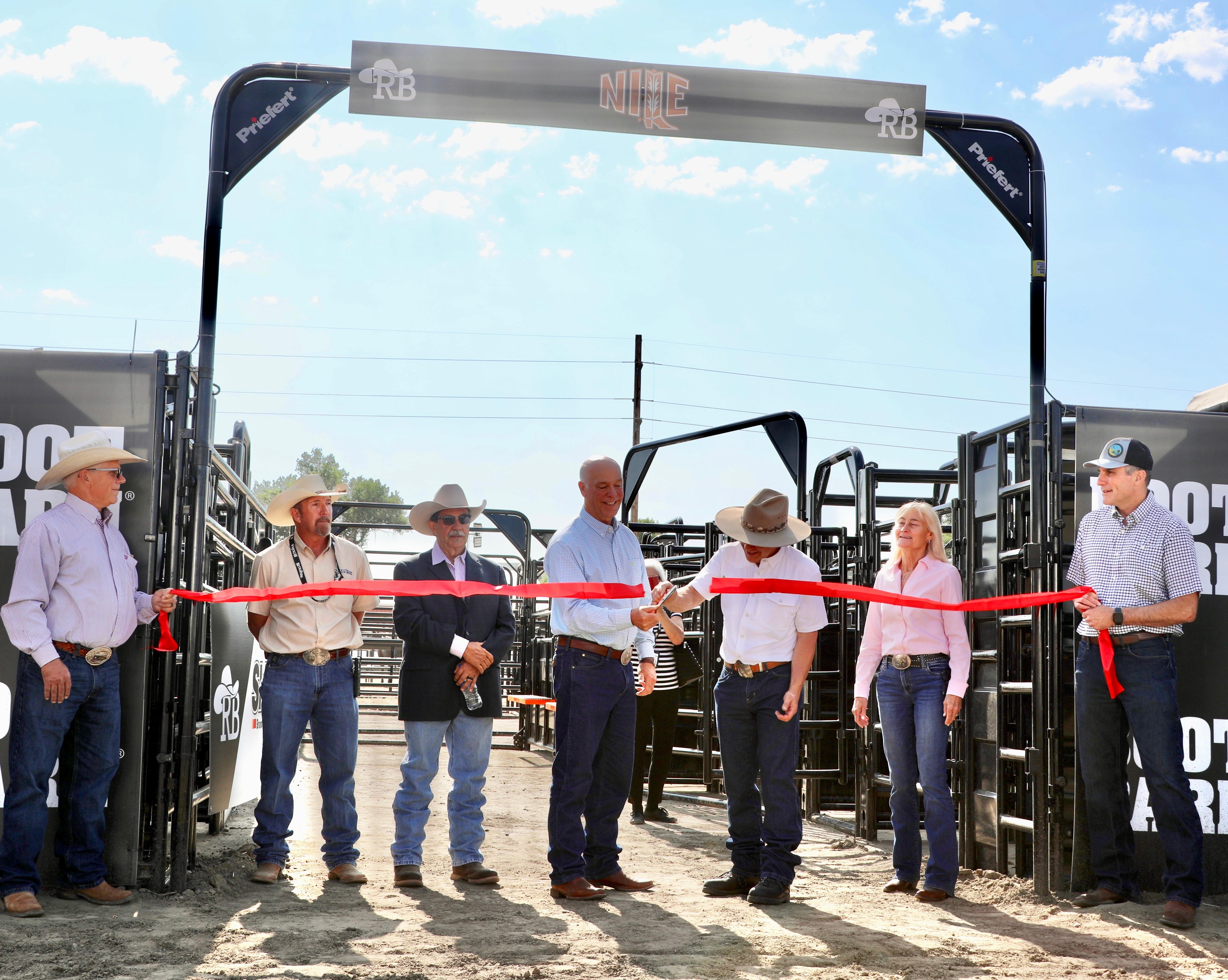 Gov. Gianforte cutting the ribbon on a new outdoor rodeo facility at MetraPark