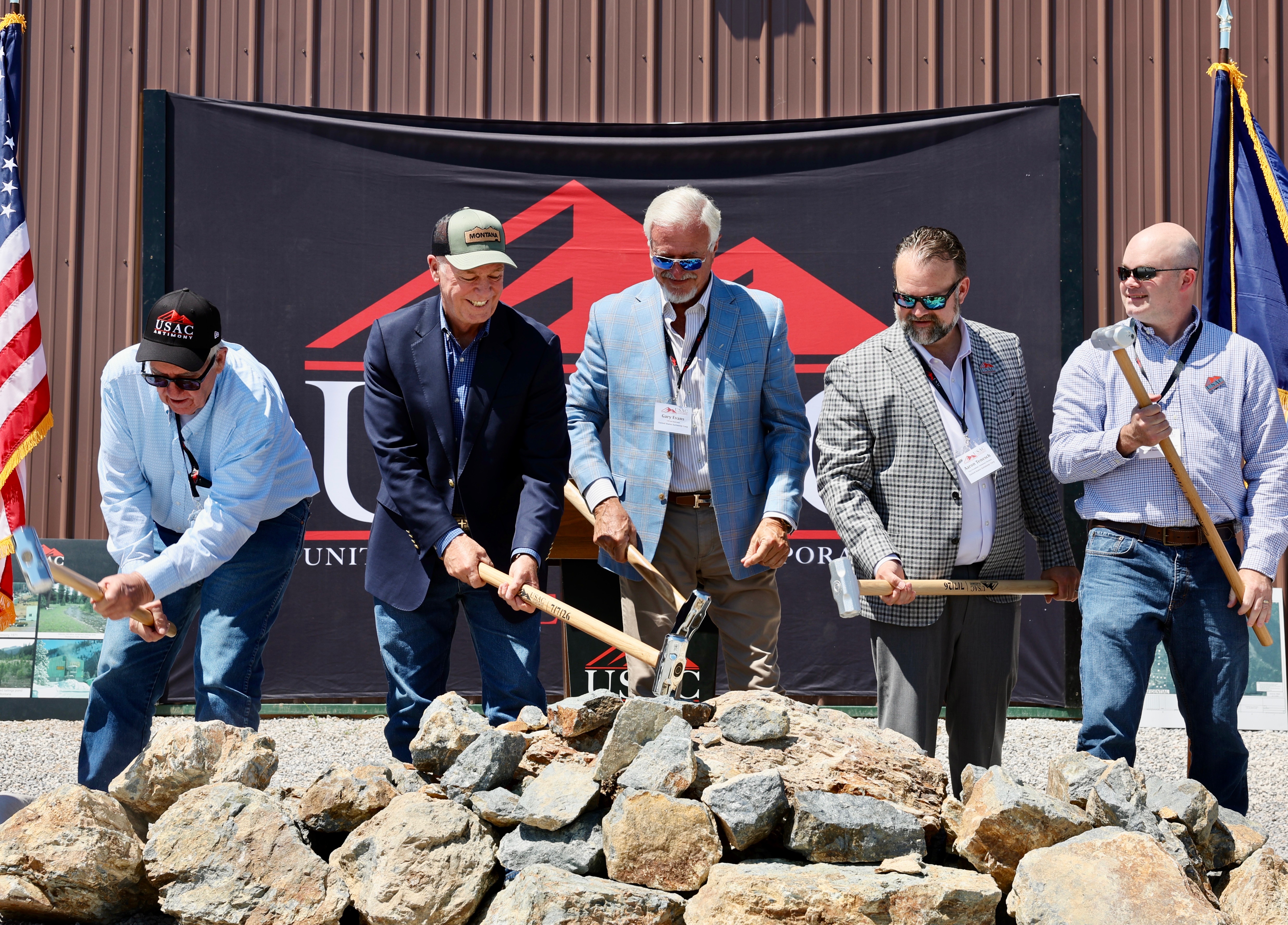 Gov. Gianforte (center left) and USAC CEO and Chairman Gary C. Evans (center) during a ceremony at the USAC critical mineral mill in Radersburg