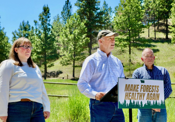 Gov. Gianforte speaking alongside DNRC Director Amanda Kaster (left) and Forest Service Chief Schultz (right) before signing a historic Shared Stewardship Agreement in Helena in June 2025