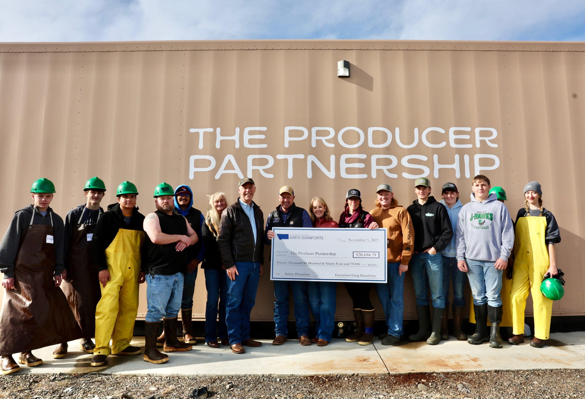 Gov. Gianforte presents a salary donation to The Producer Partnership