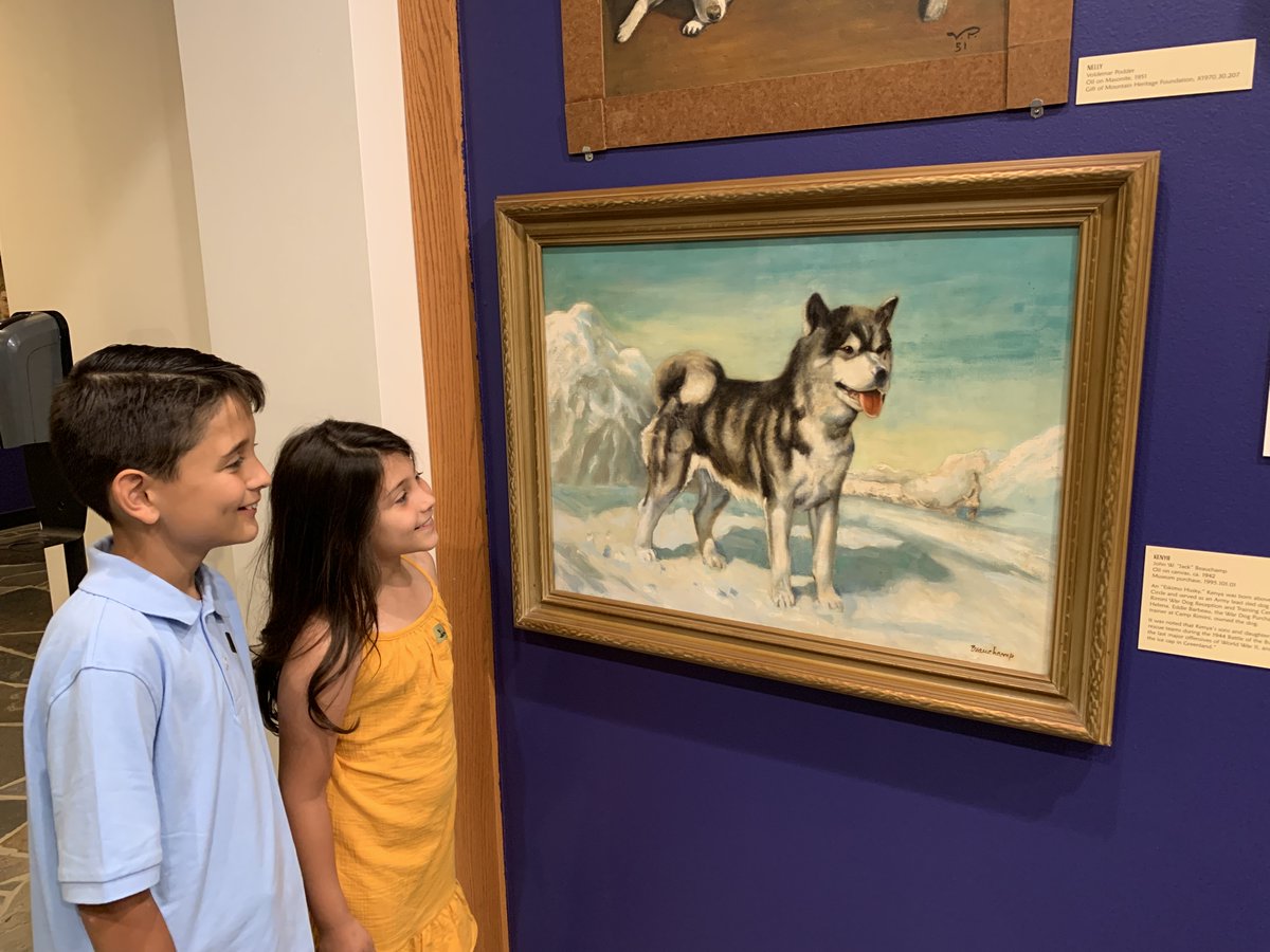 Two children enjoy learning about portraits in our collection.